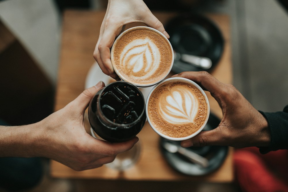 Coffee on a wooden café table