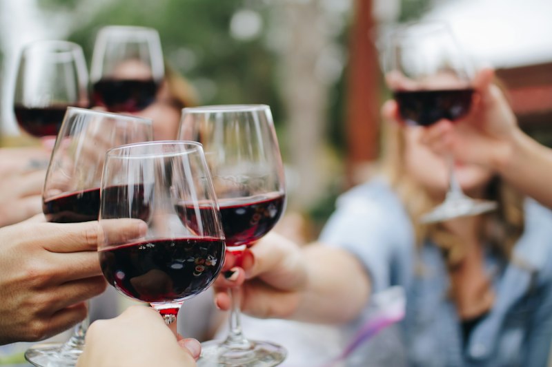 Illustrative wine being poured